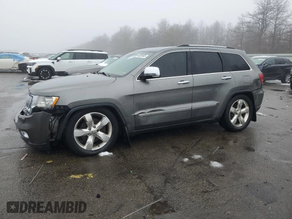 2013 Jeep Grand Cherokee Overland with VIN 1C4RJFCTXDC555233, listed as a Copart auction lot 44535045 with 104,721 mi miles and Clean Title. Bid and sale history available at carsss.com. Image 1.