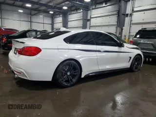 2014 BMW 4 Series 435i with VIN WBA3R1C52EK192076, listed as a Copart auction lot 60098595 with 89,504 mi miles and Salvage title. Bid and sale history available at DreamBid. Image 3.