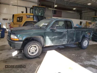 1999 Dodge Dakota SLT with VIN 1B7GG22Y9XS149398, listed as a Copart auction lot 47950025 with 173,413 mi miles and Salvage Title. Bid and sale history available at carsss.com. Image 1.
