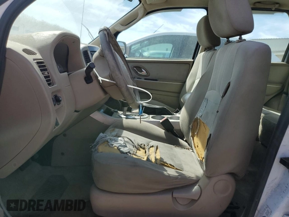 2005 Mercury Mariner Convenience с VIN 4M2YU56Z65DJ16579, выставлен на аукционе Copart как лот 48474465 с пробегом Не указан миль и На запчасти • Non repairable. История ставок и продаж доступна на DreamBid. Изображение 7.