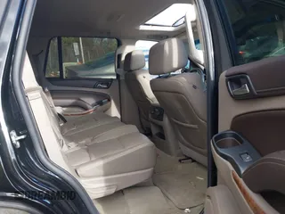 2015 Chevrolet Tahoe LTZ z VIN 1GNSKCKC3FR584689, wystawiony jako IAAI lot #41505580 z przebiegiem 37 012 mil mil oraz . Historia ofert i sprzedaży dostępna na DreamBid. Obrazek 8.