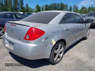 2009 Pontiac G6 1SA with VIN 1G2ZG57N794137061, listed as a IAAI auction lot 42644577 with 233,079 mi miles and . Bid and sale history available at DreamBid. Image 4.