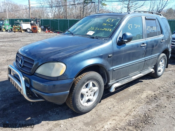 2000 Mercedes-Benz M-Class with VIN 4JGAB54E8YA148786, listed as a IAAI auction lot 41831892 with 999,999 mi miles. Bid and sale history available at carsss.com. Image 2.