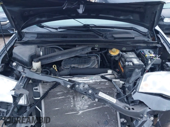 2014 Dodge Grand Caravan SXT with VIN 2C4RDGCG8ER257837, listed as a IAAI auction lot 41211629 with 139,231 mi miles and . Bid and sale history available at DreamBid. Image 10.