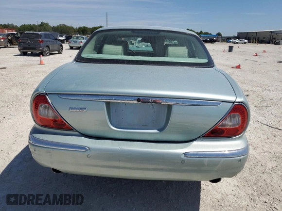 2005 Jaguar XJ Vanden Plas with VIN SAJWA82C45SG47028, listed as a Copart auction lot 49224525 with Not provided miles and Salvage title. Bid and sale history available at DreamBid. Image 6.