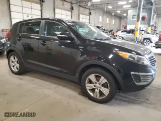 2012 Kia Sportage LX with VIN KNDPBCA27C7296642, listed as a Copart auction lot 52389225 with 142,181 mi miles and Clean Title. Bid and sale history available at carsss.com. Image 4.