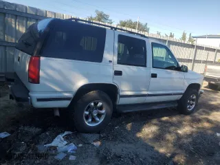 1998 Chevrolet Tahoe with VIN 1GNEK13R1WJ337920, listed as a Copart auction lot 87157844 with 207,952 mi miles and Clean Title. Bid and sale history available at carsss.com. Image 3.