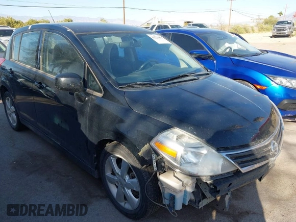 2012 Nissan Versa S with VIN 3N1BC1CP3CL360582, listed as a IAAI auction lot 41773403 with 148,525 mi miles. Bid and sale history available at carsss.com. Image 1.