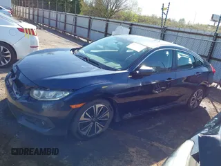 2016 Honda Civic Sedan EX-T with VIN 19XFC1F30GE025233, listed as a IAAI auction lot 41987604 with 129,311 mi miles. Bid and sale history available at carsss.com. Image 14.