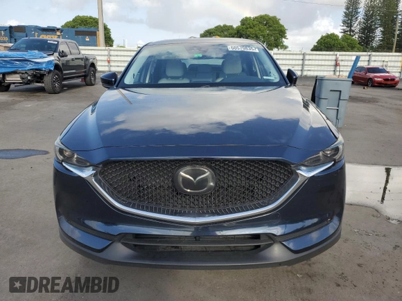 2018 Mazda CX-5 Grand Touring with VIN JM3KFADMXJ1353942, listed as a Copart auction lot 60570835 with 74,400 mi miles and Clean title. Bid and sale history available at DreamBid. Image 5.