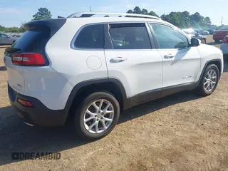 2016 Jeep Cherokee Latitude with VIN 1C4PJLCS1GW320140, listed as a IAAI auction lot 41991414 with Not provided miles and . Bid and sale history available at DreamBid. Image 4.
