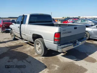 2000 Dodge 1500 with VIN 3B7HC13Y0YM223231, listed as a IAAI auction lot 42001081 with 150,878 mi miles. Bid and sale history available at carsss.com. Image 3.