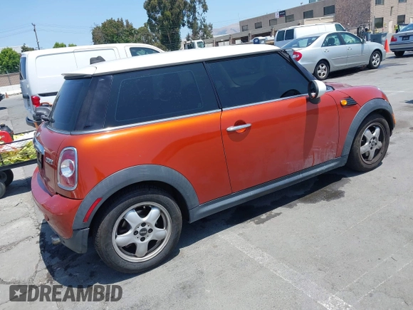 2011 MINI Hardtop with VIN WMWSU3C50BT094515, listed as a IAAI auction lot 42500608 with 154,534 mi miles and . Bid and sale history available at DreamBid. Image 4.