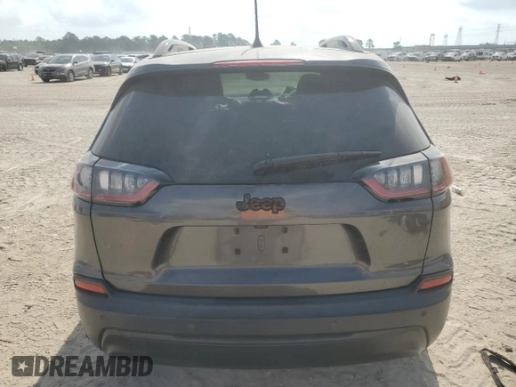 2021 Jeep Cherokee Altitude with VIN 1C4PJLLB0MD173851, listed as a Copart auction lot 53500385 with 57,674 mi miles and Salvage title. Bid and sale history available at DreamBid. Image 6.