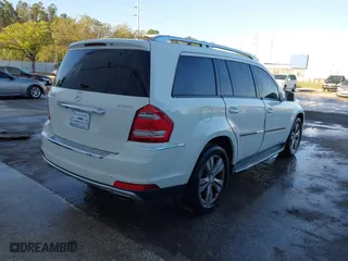 2011 Mercedes-Benz GL-Class GL 450 with VIN 4JGBF7BE1BA641658, listed as a IAAI auction lot 41756641 with 148,474 mi miles. Bid and sale history available at carsss.com. Image 4.