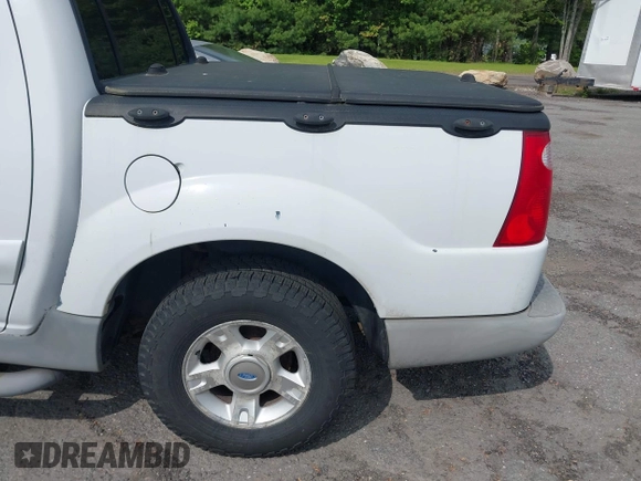 2002 Ford Explorer Sport Trac Value with VIN 1FMZU77E92UB70693, listed as a IAAI auction lot 42374862 with 144,712 mi miles and . Bid and sale history available at DreamBid. Image 14.