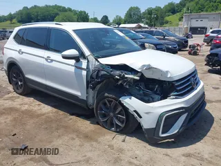 2022 Volkswagen Tiguan SE with VIN 3VV3B7AX0NM161692, listed as a IAAI auction lot 42426204 with 56,969 mi miles and . Bid and sale history available at DreamBid. Image 1.