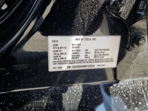 2024 Tesla Model Y z VIN 7SAYGDED8RF123516, wystawiony jako Copart lot #55354655 z przebiegiem 12 521 mil mil oraz Szkoda całkowita • Salvage title. Historia ofert i sprzedaży dostępna na DreamBid. Obrazek 13.