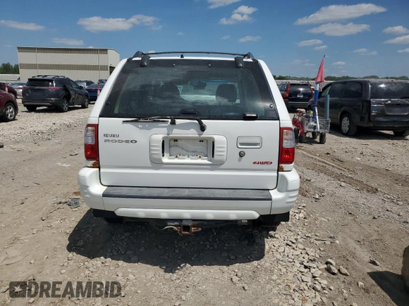 2001 Isuzu Rodeo S with VIN 4S2DM58W414330847, listed as a Copart auction lot 64028134 with 160,027 mi miles and Clean title. Bid and sale history available at DreamBid. Image 6.