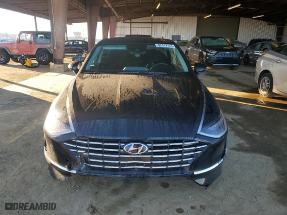 2023 Hyundai Sonata Hybrid SEL with VIN KMHL34JJ7PA077967, listed as a Copart auction lot 82417124 with 19,228 mi miles and Salvage Title. Bid and sale history available at carsss.com. Image 5.