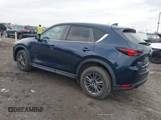 2021 Mazda CX-5 Touring with VIN JM3KFBCM1M1336457, listed as a IAAI auction lot 42034330 with 39,910 mi miles. Bid and sale history available at carsss.com. Image 3.
