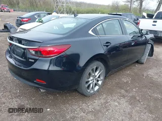 2014 Mazda 6 i Grand Touring with VIN JM1GJ1W62E1157897, listed as a IAAI auction lot 41952291 with 161,255 mi miles. Bid and sale history available at carsss.com. Image 4.
