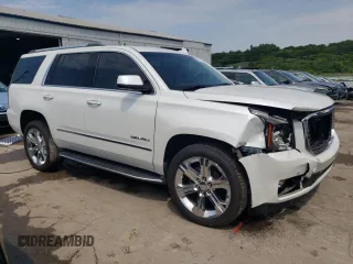 2016 GMC Yukon Denali with VIN 1GKS2CKJ3GR391360, listed as a Copart auction lot 65940114 with 51,040 mi miles and Salvage Title. Bid and sale history available at carsss.com. Image 4.