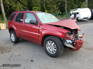 2007 Mercury Mariner Luxury with VIN 4M2YU91117KJ01804, listed as a Copart auction lot 71053404 with 88,575 mi miles and Salvage Title. Bid and sale history available at carsss.com. Image 4.