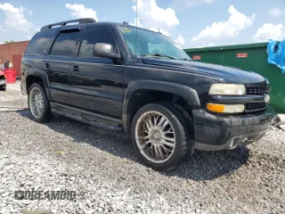 2005 Chevrolet Tahoe Z71 with VIN 1GNEC13T85R200692, listed as a Copart auction lot 62088855 with 242,402 mi miles and Salvage title. Bid and sale history available at DreamBid. Image 4.
