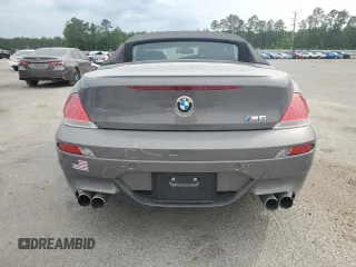 2007 BMW 6 Series M6 z VIN WBSEK93557CY78648, wystawiony jako Copart lot #52179345 z przebiegiem 22 453 mil mil oraz Szkoda całkowita • Salvage title. Historia ofert i sprzedaży dostępna na DreamBid. Obrazek 6.