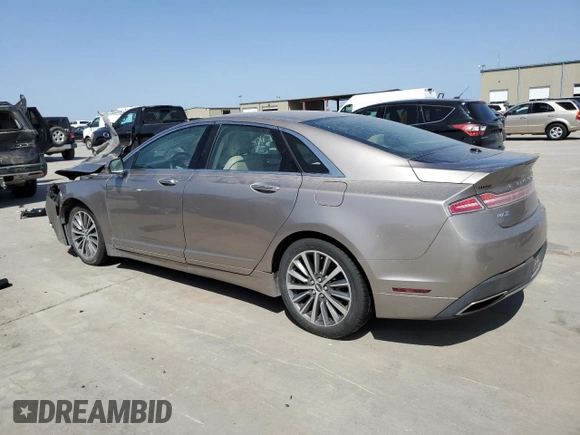 2019 Lincoln MKZ Standard z VIN 3LN6L5A98KR631346, wystawiony jako Copart lot #49717185 z przebiegiem Nie podano mil oraz Nie do naprawy. Historia ofert i sprzedaży dostępna na DreamBid. Obrazek 2.