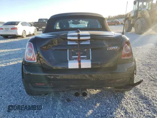 2012 MINI Roadster S z VIN WMWSY3C51CT565240, wystawiony jako Copart lot #83651954 z przebiegiem 172 954 mil mil oraz Szkody całkowita. Historia ofert i sprzedaży dostępna na DreamBid. Obrazek 6.