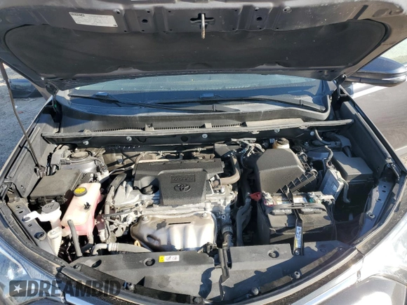 2018 Toyota RAV4 XLE with VIN 2T3WFREV0JW517488, listed as a Copart auction lot 51000975 with 68,105 mi miles and Salvage title. Bid and sale history available at DreamBid. Image 12.