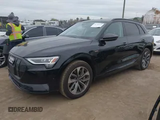 2021 Audi e-tron Premium Plus with VIN WA1LAAGEXMB019208, listed as a IAAI auction lot 41725933 with 51,565 mi miles and . Bid and sale history available at DreamBid. Image 2.