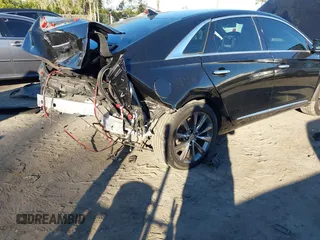 2014 Cadillac XTS with VIN 2G61L5S34E9261034, listed as a IAAI auction lot 41250779 with 178,218 mi miles. Bid and sale history available at carsss.com. Image 6.