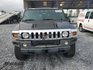 2006 Hummer H2 z VIN 5GRGN23U66H116855, wystawiony jako Copart lot #56010175 z przebiegiem 217 798 mil mil oraz Tytuł czysty. Historia ofert i sprzedaży dostępna na DreamBid. Obrazek 5.
