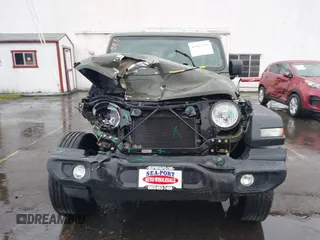 2021 Jeep Wrangler Unlimited Willys with VIN 1C4HJXDN5MW592125, listed as a IAAI auction lot 40821100 with 82,109 mi miles and . Bid and sale history available at DreamBid. Image 12.