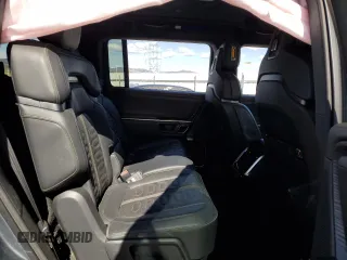 2023 Rivian R1S Adventure z VIN 7PDSGABA3PN018823, wystawiony jako Copart lot #53184595 z przebiegiem 36 677 mil mil oraz Szkoda całkowita • Salvage title. Historia ofert i sprzedaży dostępna na DreamBid. Obrazek 12.