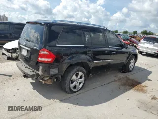 2012 Mercedes-Benz GL 450 z VIN 4JGBF7BE2CA797693, wystawiony jako Copart lot #57954415 z przebiegiem 138 594 mil mil oraz Szkoda całkowita • Salvage title. Historia ofert i sprzedaży dostępna na DreamBid. Obrazek 3.