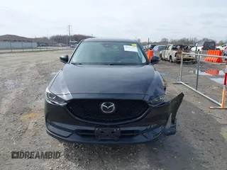 2018 Mazda CX-5 Touring with VIN JM3KFBCMXJ0438177, listed as a IAAI auction lot 42152275 with 65,434 mi miles and . Bid and sale history available at carsss.com. Image 12.