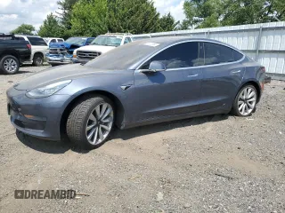 2020 Tesla Model 3 Standard Range Plus with VIN 5YJ3E1EA6LF614045, listed as a Copart auction lot 65222584 with 59,823 mi miles and Salvage Title. Bid and sale history available at DreamBid. Image 1.