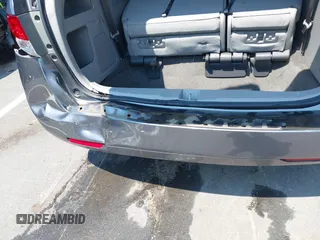 2014 Honda Odyssey EX-L with VIN 5FNRL5H63EB073585, listed as a IAAI auction lot 42673004 with 119,971 mi miles and . Bid and sale history available at DreamBid. Image 18.