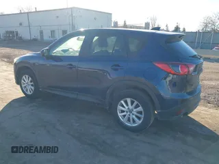 2014 Mazda CX-5 Touring with VIN JM3KE2CY8E0375009, listed as a IAAI auction lot 41420045 with 138,404 mi miles. Bid and sale history available at carsss.com. Image 3.
