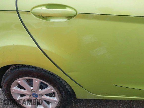 2013 Ford Fiesta SE with VIN 3FADP4EJ7DM136723, listed as a IAAI auction lot 42090284 with 168,004 mi miles and . Bid and sale history available at DreamBid. Image 6.