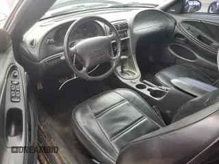 2003 Ford Mustang Deluxe z VIN 1FAFP44433F364091, wystawiony jako Copart lot #54061935 z przebiegiem 201 406 mil mil oraz Szkoda całkowita • Salvage title. Historia ofert i sprzedaży dostępna na DreamBid. Obrazek 8.