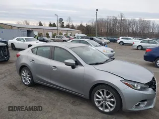 2015 Mazda 3 S Grand Touring z VIN JM1BM1W3XF1264463, wystawiony jako IAAI lot #41597081 z przebiegiem 65 240 mil mil oraz . Historia ofert i sprzedaży dostępna na DreamBid. Obrazek 1.