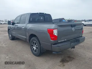 2020 Nissan Titan Platinum Reserve with VIN 1N6AA1EF1LN503027, listed as a IAAI auction lot 41937860 with 88,250 mi miles and . Bid and sale history available at DreamBid. Image 3.