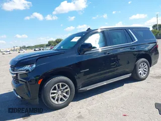 2023 Chevrolet Tahoe LS z VIN 1GNSCMKD9PR282840, wystawiony jako IAAI lot #41904280 z przebiegiem 73 298 mil mil oraz . Historia ofert i sprzedaży dostępna na DreamBid. Obrazek 2.