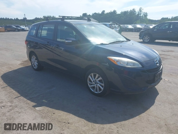 2015 Mazda 5 Sport with VIN JM1CW2BLXF0182264, listed as a IAAI auction lot 42638417 with 142,003 mi miles and . Bid and sale history available at DreamBid. Image 1.