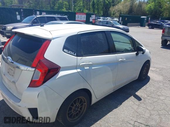 2015 Honda Fit EX z VIN 3HGGK5G84FM733886, wystawiony jako IAAI lot #42298129 z przebiegiem 84 383 mil mil oraz . Historia ofert i sprzedaży dostępna na DreamBid. Obrazek 13.